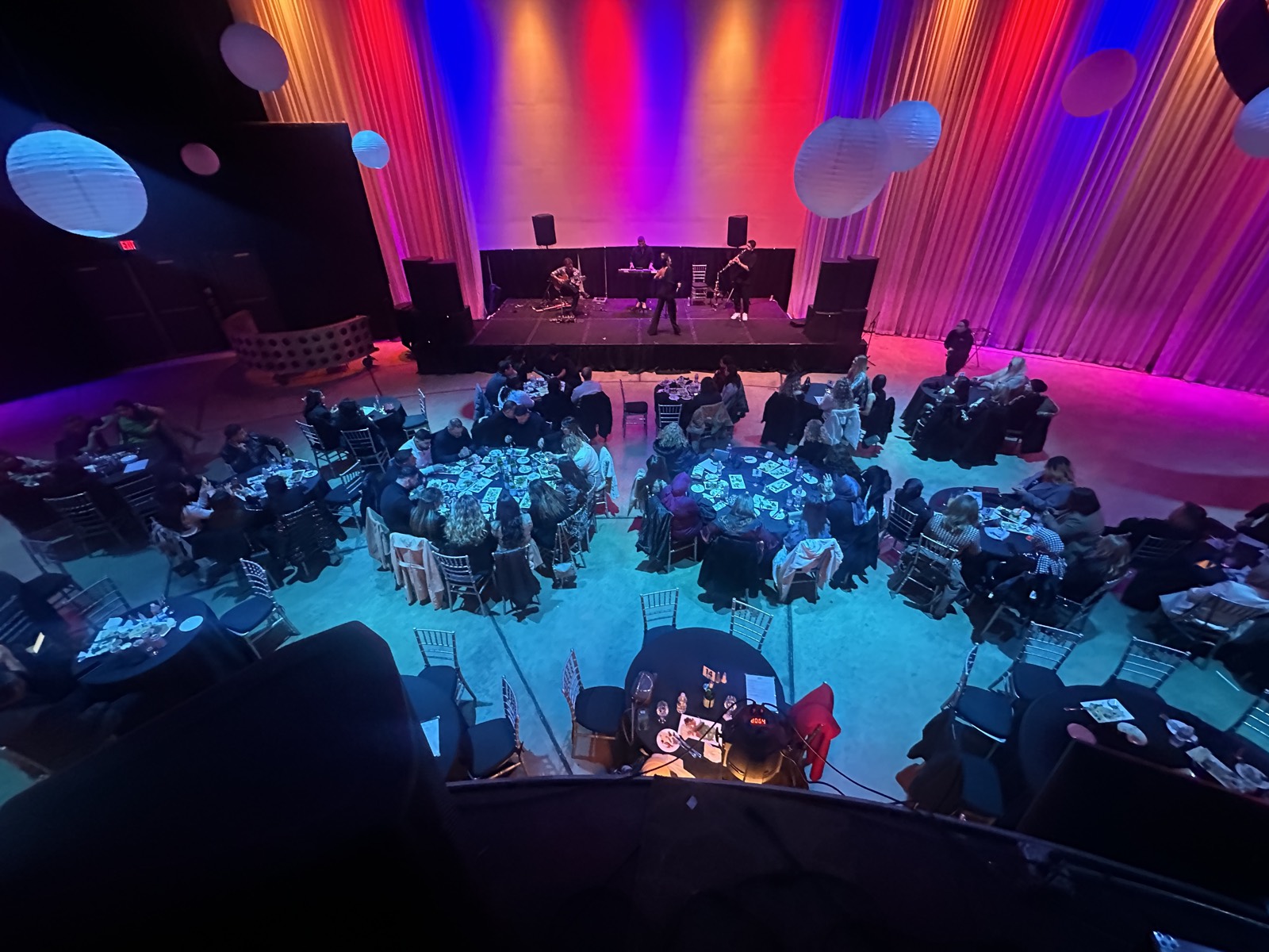 Gala dinner with colorful stage lighting